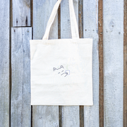 Nachhaltige Baumwoll-Tragetasche mit verspieltem Katzenmotiv und Pflanze in der Pfote